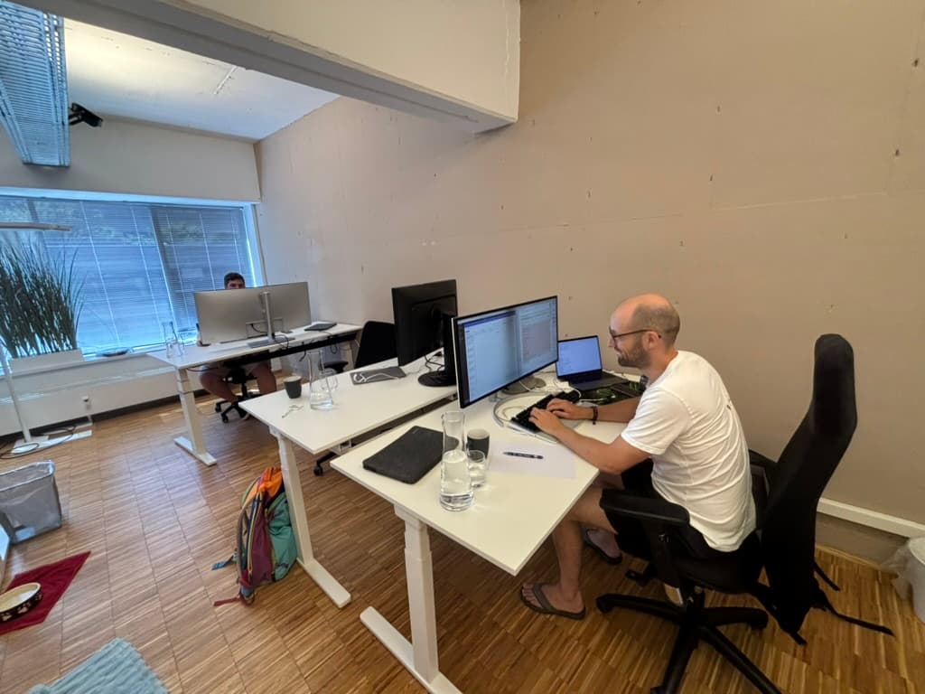 Billy planning the product architecture at the whiteboard